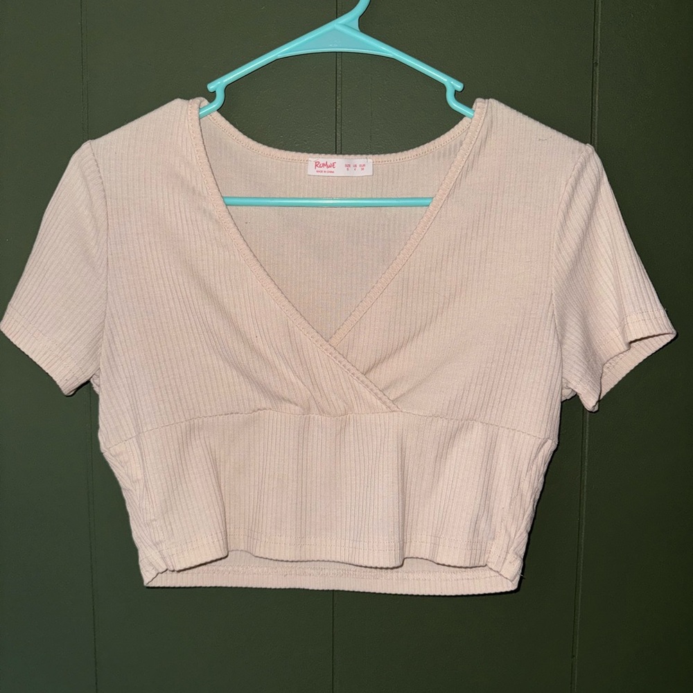 Romwe pastel yellow crop top with an overlay in the front.